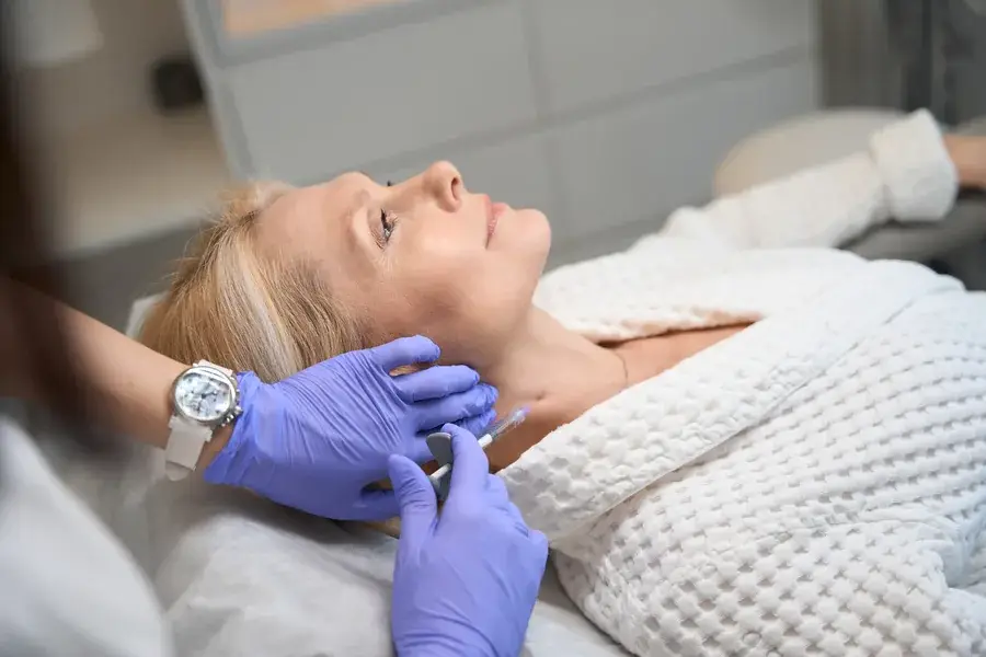 A neck wrinkle-relaxer injection to soften platysmal neck bands at a Thonotosassa, FL medical spa