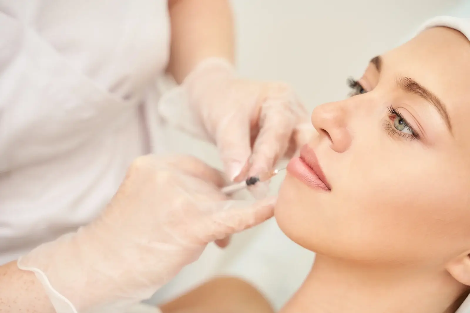 A certified injector performing a precise wrinkle-relaxer injection under physician oversight at SpaRx Medical Aesthetics in Thonotosassa, FL.